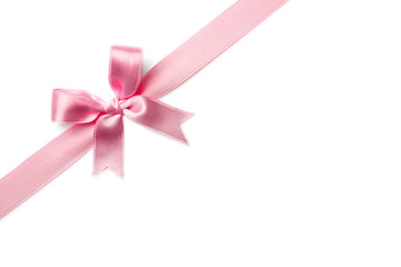 Pink ribbon bow on white background