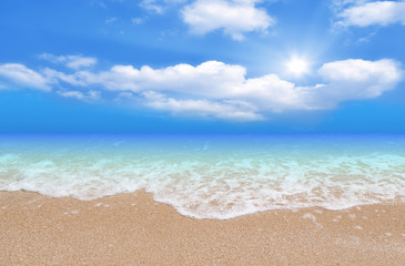 Fototapeta na wymiar Wave & Sand beach with blue sky background