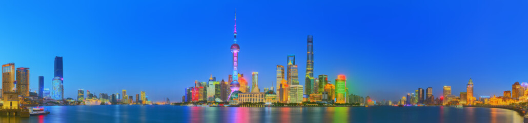 Beautiful night Shanghai's cityscape with the city lights on the Huangpu River, Shanghai, China.