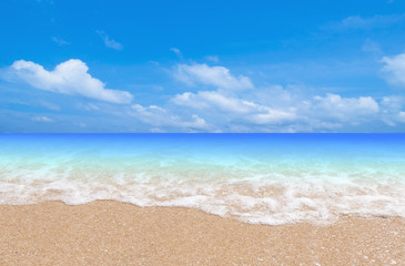 Wave & Sand beach with blue sky background