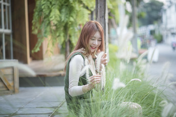 portrait of attractive asian girl in coffee shop