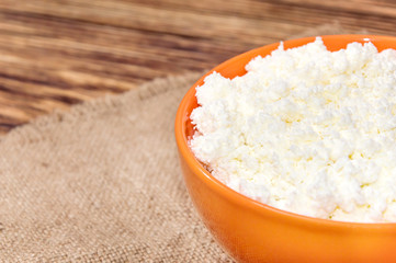 Bowl of cottage cheese on burlap