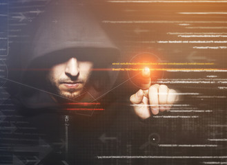 hacker at work with graphic user interface around