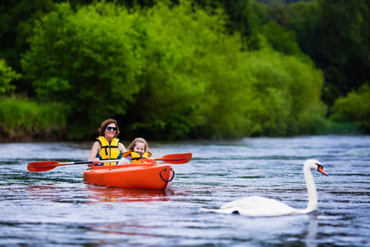 Mother and child in a kayak