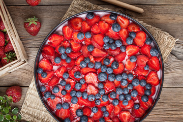 Homemade strawberry and blueberry cheesecake for dessert.