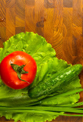 stilllife - tomatoes, green garlic and lettuce