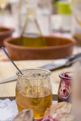 Artisan fruit jam on a glass pot on a breakfast table