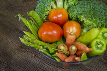 green vegetables on wood background