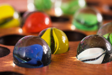 Close up of marbles in a solitare game