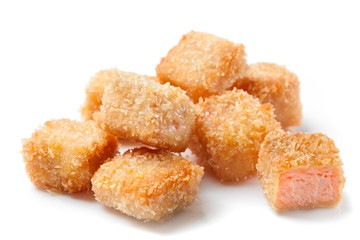 crispy salmon fish nuggets isolated on white