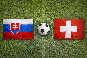 Slovakia vs. Switzerland flags on soccer field