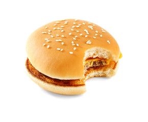 Bitten cheeseburger, isolated on white