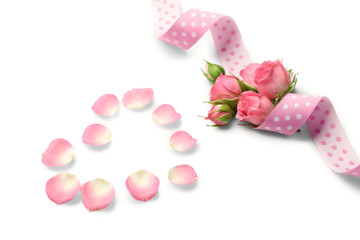 Fototapeta na wymiar Pink ribbon with flowers. Wedding concept