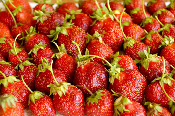 Scattering of dark red strawberry