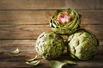 Artichoke on wooden background
