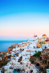 Naklejka premium Oia Town on Santorini Island, Greece. Sunrise. Traditional House