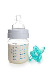 Baby milk bottle with pacifier, isolated on white