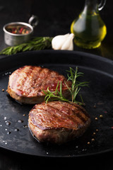 Grilled Beef steak with pepper, rosemary and salt