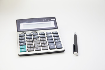 calculator  and pen