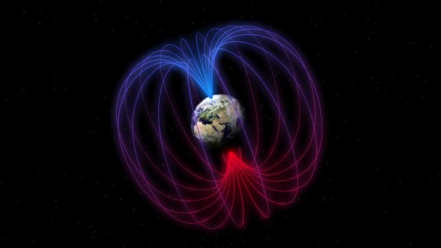 Scientific animation of the earth's magnetic field lines glowing (earth texture by NASA)