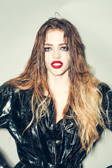 Pretty woman in leather coat