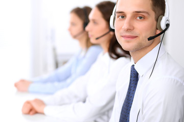 Young business man in headset. Call center