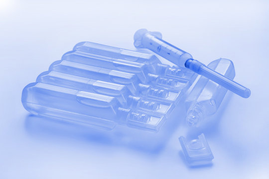 Blue ampules and  syringe