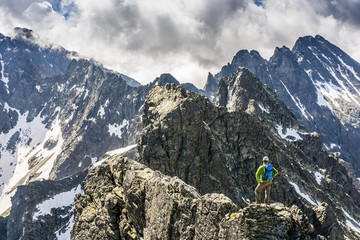 Standing on an exposed ridge.