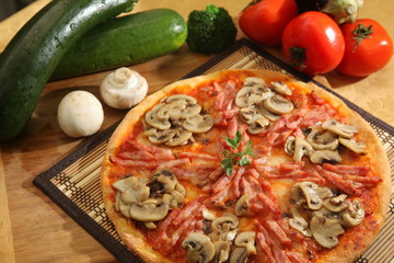 Pizza with mushrooms and sausage