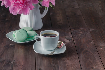 Cup coffee and flowers peonies