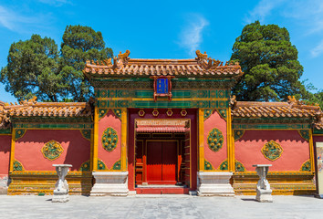 oriental red gate inside Beijing Forbidden City, China