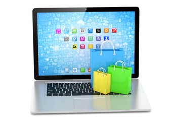 laptop and  shopping pags on white background. 3d rendering.