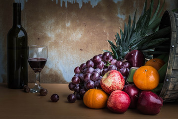 Many fruits and wine bottles