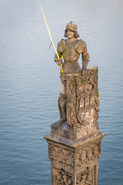 Prague, Czech Republic - May 25, 2016: View of statue of the knight Bruncvik at south side of Charles bridge. By legend knight will save Bohemia in the worst times. 