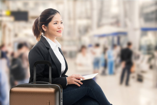 business traveler waiting with airport background