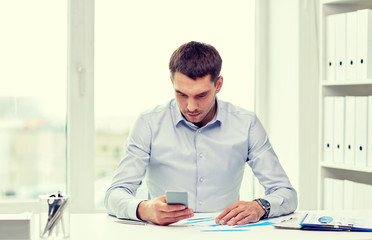 close up of businessman with smartphone