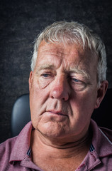 Older depressed man, selective focus,