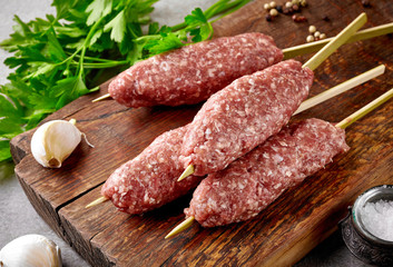 fresh raw minced meat skewers kebabs
