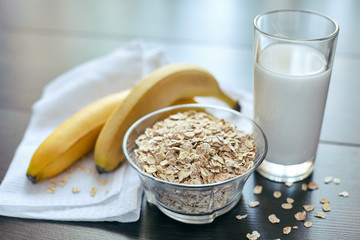 Breakfast. Oatmeal with milk, banana, apple and lemon
