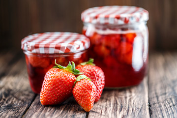 Strawberry jam on a wooden