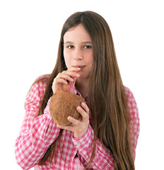 girl drinking from a coconut