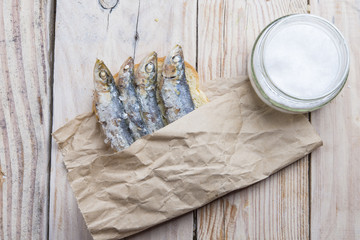 fried sardines on the plate