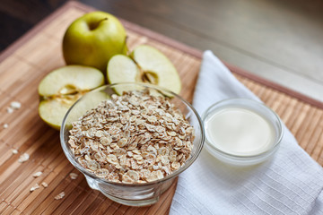 Breakfast. Oatmeal with milk, juice, banana, apple and lemon