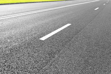 Asphalt road with marking lines white stripes