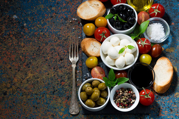 mozzarella, ingredients for the salad and bread 