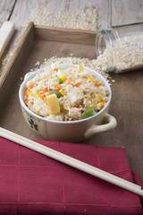 Rice with vegetables on white background