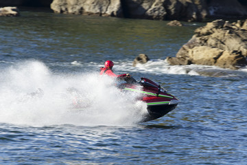 Fototapeta premium lifeguards in jet ski in rescue training