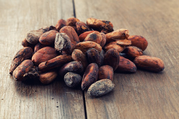 Cocoa beans on a wooden table