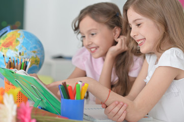 Fototapeta premium beautiful little girls at class