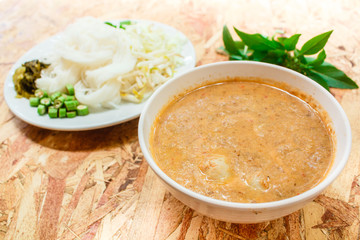 Rice noodles in fish curry sauce (Kanom Jeen Nam Ya).